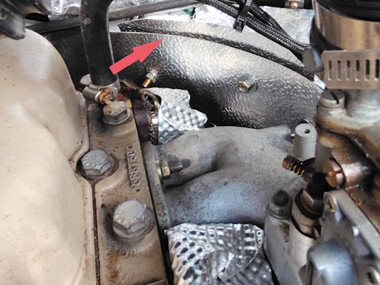 Custom aluminium manifold heat shield on Land Rover 2.25 engine