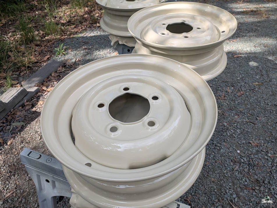 Gloss green painted wheel rim stack template showcase row